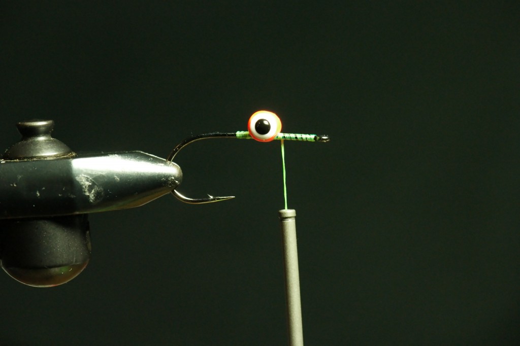 Securing Hareline Double Pupil Eyes to partridge Attitude Extra hook.